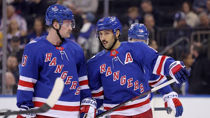 Nov 10, 2025; New York, New York, USA; New York Rangers center Vincent Trocheck (16) talks to left wing Alexis Lafreniere (13) during the first period against the Nashville Predators at Madison Square Garden. Mandatory Credit: Brad Penner-Imagn Images