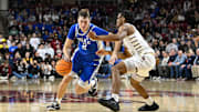Jan 18, 2025; Chestnut Hill, Massachusetts, USA; Duke Blue Devils guard Cooper Flagg (2) dribbles the ball against Boston College Eagles guard Donald Hand Jr. (13) during the second half at Conte Forum. Mandatory Credit: Eric Canha-Imagn Images