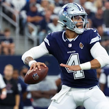 Dallas Cowboys quarterback Dak Prescott throws during the first quarter against the Detroit Lions.