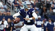 Dallas Cowboys quarterback Dak Prescott throws during the first quarter against the Detroit Lions at AT&T Stadium.
