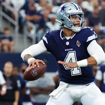 Dallas Cowboys quarterback Dak Prescott throws during the first quarter against the Detroit Lions at AT&T Stadium.
