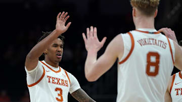 Texas Longhorns guard Dailyn Swain is congratulated by center Matas Vokietaitis during the first half against the Southern University Jaguars at Moody Center.