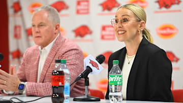 Athletic Director Hunter Yurachek with women's basketball coach Kelsi Musick at the introductory press conference  
