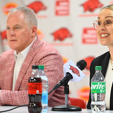Athletic Director Hunter Yurachek with women's basketball coach Kelsi Musick at the introductory press conference  