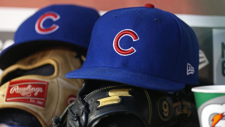 Jun 26, 2017; Washington, DC, USA; The cap and glove of Chicago Cubs second baseman Javier Baez (9) rest in the dugout against the Washington Nationals at Nationals Park. 