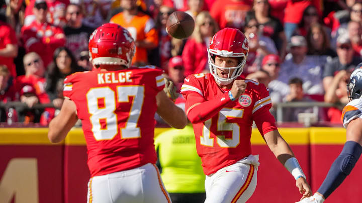 Nov 10, 2024; Kansas City, Missouri, USA; Kansas City Chiefs quarterback Patrick Mahomes (15) throws to tight end Travis Kelce (87) against the Denver Broncos during the first half at GEHA Field at Arrowhead Stadium. Mandatory Credit: Denny Medley-Imagn Images Nov 10, 2024; Kansas City, Missouri, USA; Kansas City Chiefs quarterback Patrick Mahomes (15) throws to tight end Travis Kelce (87) against the Denver Broncos during the first half at GEHA Field at Arrowhead Stadium. Mandatory Credit: Denny Medley-Imagn Images