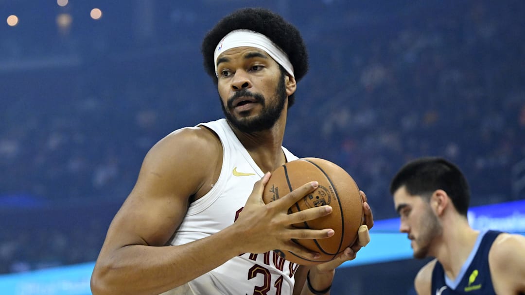 Nov 15, 2025; Cleveland, Ohio, USA; Cleveland Cavaliers center Jarrett Allen (31) rebounds in the first quarter against the Memphis Grizzlies at Rocket Arena. Mandatory Credit: David Richard-Imagn Images