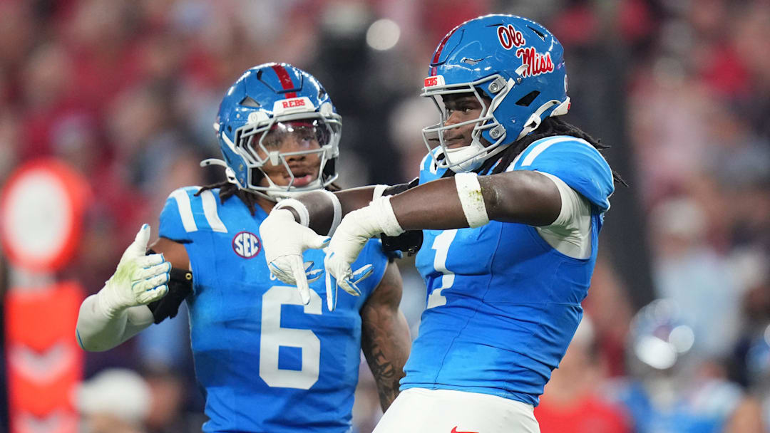 Ole Miss Rebels linebacker Princewill Umanmielen (1) celebrates his sack against the Miami Hurricanes during their Vrbo Fiesta Bowl matchup at State Farm Stadium on Jan. 8, 2026.