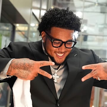 Iowa native Kadyn Proctor is one of Alabama's top football players, but doesn't think he deserves to be in the discussion as greatest Iowa athlete after Caitlin Clark's career.