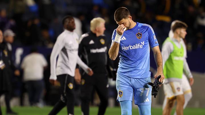 Mar 29, 2025; Carson, California, USA;  LA Galaxy goalkeeper John McCarthy (77) leaves the field after a loss to Orlando City at Dignity Health Sports Park. Mandatory Credit: Kiyoshi Mio-Imagn Images