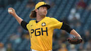 Aug 22, 2025; Pittsburgh, Pennsylvania, USA;  Pittsburgh Pirates starting pitcher Braxton Ashcraft (67) delivers a pitch against the Colorado Rockies during the first inning at PNC Park. Mandatory Credit: Charles LeClaire-Imagn Images