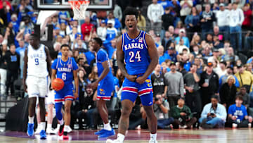 Nov 26, 2024; Las Vegas, Nevada, USA; Kansas Jayhawks forward KJ Adams Jr. (24) celebrates after making a play against the Duke Blue Jackets in the second half  at T-Mobile Arena. Mandatory Credit: Stephen R. Sylvanie-Imagn Images