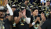 Dec 17, 2024; Las Vegas, Nevada, USA; Milwaukee Bucks forward Giannis Antetokounmpo (34), guard Damian Lillard (0) and center Brook Lopez (11) celebrate after winning the Emirates NBA Cup championship game against the Oklahoma City Thunder at T-Mobile Arena. Mandatory Credit: Kyle Terada-Imagn Images