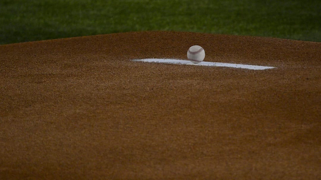 A view of an MLB baseball and the pitcher’s mound before the game between the Texas Rangers and the Arizona Diamondbacks at Globe Life Field. A view of an MLB baseball and the pitcher’s mound before the game between the Texas Rangers and the Arizona Diamondbacks at Globe Life Field.