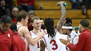Nov 5, 2025; Bloomington, Indiana, USA; Indiana Hoosiers forward Tucker Devries (12) and Indiana Hoosiers guard Lamar Wilkerson (3) celebrate on the bench during the second half Alabama A&M Bulldogs at Simon Skjodt Assembly Hall. Mandatory Credit: Robert Goddin-Imagn Images
