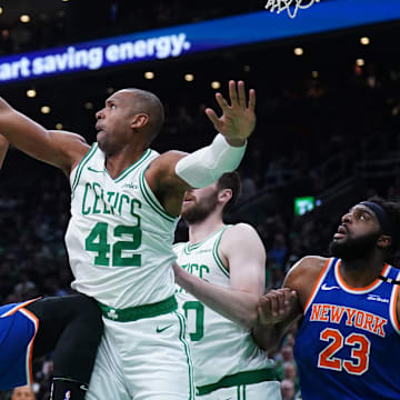 May 5, 2025; Boston, Massachusetts, USA; New York Knicks center Karl-Anthony Towns (32) shoots the ball agai9nst Boston Celtics center Al Horford (42) in the first quarter during game one of the second round for the 2025 NBA Playoffs at TD Garden. Mandatory Credit: David Butler II-Imagn Images