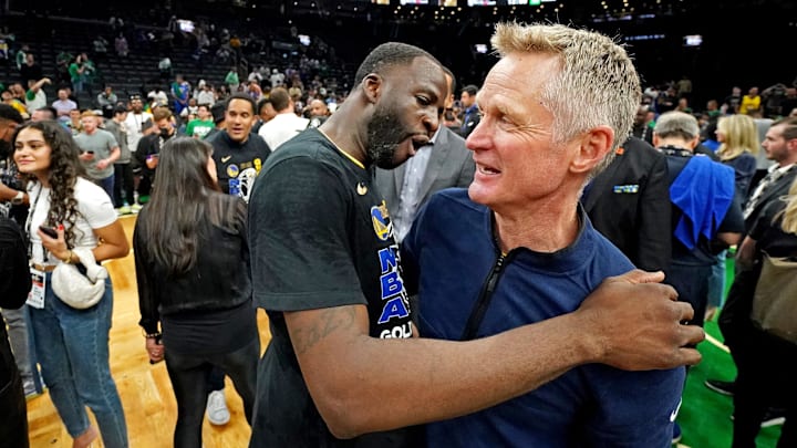 Jun 16, 2022; Boston, Massachusetts, USA; Golden State Warriors forward Draymond Green (23) celebrates with head coach Steve Kerr after the Golden State Warriors beat the Boston Celtics in game six of the 2022 NBA Finals to win the NBA Championship at TD Garden.