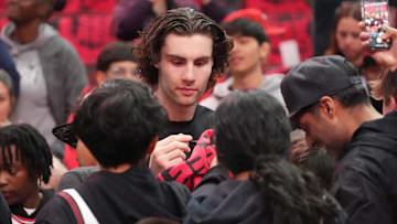 Apr 16, 2025; Chicago, Illinois, USA; Chicago Bulls guard Josh Giddey (3) signs autographs before the game against the Miami Heat at United Center. Mandatory Credit: David Banks-Imagn Images
