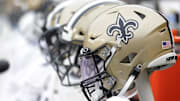 Oct 10, 2021; Landover, Maryland, USA; New Orleans Saints players' helmets on the bench against the Washington Football Team at FedExField. Mandatory Credit: Geoff Burke-Imagn Images