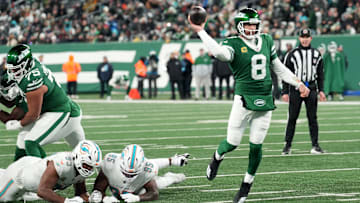 New York Jets quarterback Aaron Rodgers throws his 500th career touchdown pass in the second quarter of the game against the Miami Dolphins on Jan. 5, 2025, in East Rutherford, N.J.