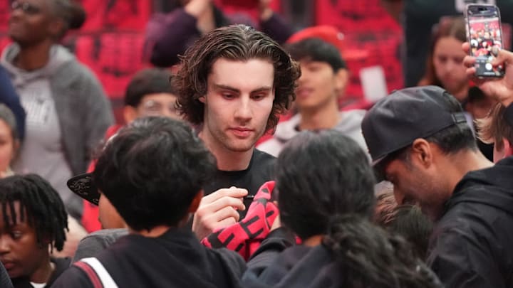 Apr 16, 2025; Chicago, Illinois, USA; Chicago Bulls guard Josh Giddey (3) signs autographs before the game against the Miami Heat at United Center. Mandatory Credit: David Banks-Imagn Images