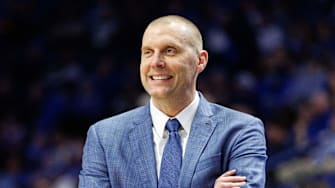 Feb 8, 2025; Lexington, Kentucky, USA; Kentucky Wildcats head coach Mark Pope smiles as he watches the action during the second half against the South Carolina Gamecocks at Rupp Arena at Central Bank Center. Mandatory Credit: Jordan Prather-Imagn Images