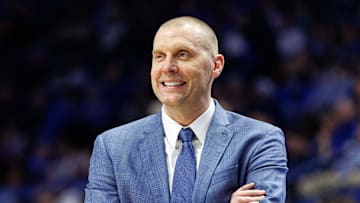 Feb 8, 2025; Lexington, Kentucky, USA; Kentucky Wildcats head coach Mark Pope smiles as he watches the action during the second half against the South Carolina Gamecocks at Rupp Arena at Central Bank Center. Mandatory Credit: Jordan Prather-Imagn Images