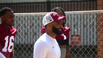 FSU football players walk into the first spring practice of the spring season on Wednesday, March 19, 2025