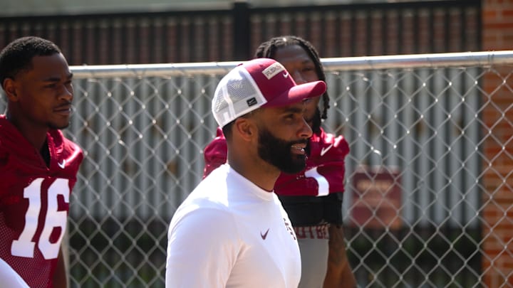 FSU football players walk into the first spring practice of the spring season on Wednesday, March 19, 2025
