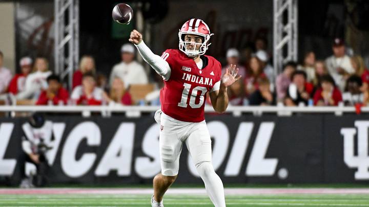 Sep 25, 2026; Bloomington, Indiana, USA; Indiana Hoosiers quarterback Josh Hoover (10) throws a pass against the Northwestern Wildcats during the first half at Merchants Bank Field at Memorial Stadium. Mandatory Credit: Robert Goddin-Imagn Images