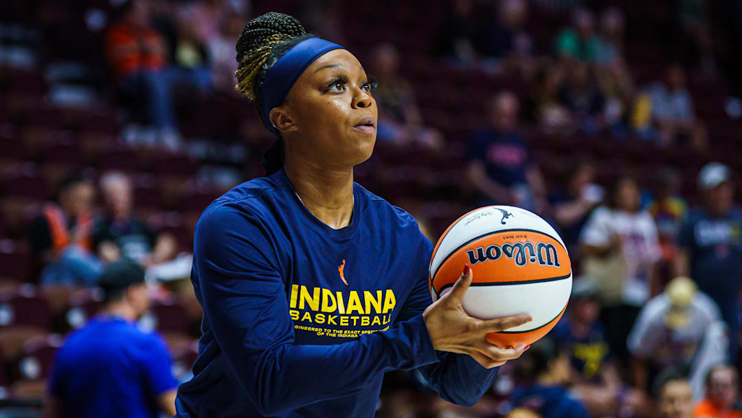 Aug 17, 2025; Uncasville, Connecticut, USA; Indiana Fever guard Odyssey Sims (1) warms up before the start of the game against the Connecticut Sun at Mohegan Sun Arena. Mandatory Credit: David Butler II-Imagn Images