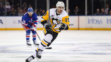 Apr 1, 2024; New York, New York, USA; Pittsburgh Penguins right wing Reilly Smith (19) skates against the New York Rangers during the first period at Madison Square Garden. Mandatory Credit: Danny Wild-USA TODAY Sports