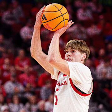 Braden Frager shoots a three-point basket against West Georgia Wolves forward Kenneth Chime during the first half.