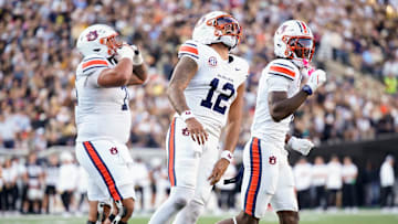 Auburn quarterback Ashton Daniels (12) celebrates his touchdown against Vanderbilt during the second quarter at FirstBank Stadium in Nashville, Tenn., Saturday, Nov. 8, 2025.