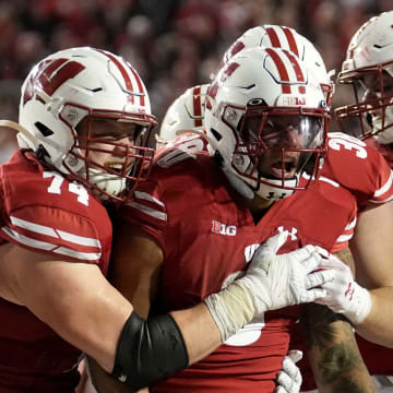 Wisconsin running back Braelon Allen (0) celebrates his touchdown run during overtime of their game Saturday, November 18, 2023 at Camp Randall Stadium in Madison, Wisconsin. Wisconsin beat Nebraska 24-17 in overtime.