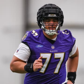 May 7, 2022; Owings Mills, MD, USA; Baltimore Ravens tackle Daniel Faalele (77) in action during rookie minicamp at Under Armour Performance Center. Mandatory Credit: Scott Taetsch-USA TODAY Sports