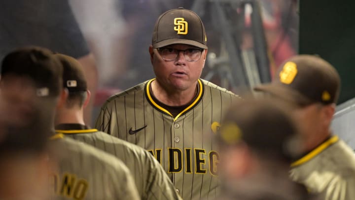 Jun 5, 2024; Anaheim, California, USA; San Diego Padres manager Mike Shildt (8) looks on in the dugout after the final out of the ninth inning against the Los Angeles Angels at Angel Stadium. Mandatory Credit: Jayne Kamin-Oncea-USA TODAY Sports