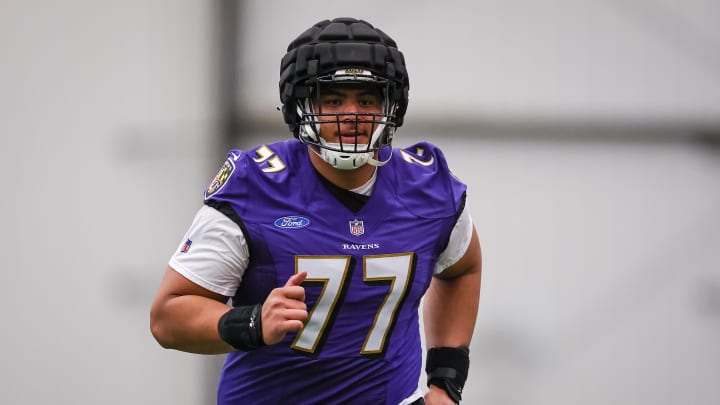 May 7, 2022; Owings Mills, MD, USA; Baltimore Ravens tackle Daniel Faalele (77) in action during rookie minicamp at Under Armour Performance Center. Mandatory Credit: Scott Taetsch-USA TODAY Sports