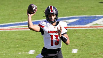 Nov 22, 2025; Dallas, Texas, USA; Louisville Cardinals quarterback Deuce Adams (13) throws the ball during the second half against the SMU Mustangs at Gerald J. Ford Stadium. Mandatory Credit: Jerome Miron-Imagn Images