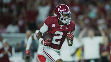 Aug 31, 2024; Tuscaloosa, Alabama, USA; Alabama Crimson Tide wide receiver Ryan Williams (2) carries the ball for a touchdown against the Western Kentucky Hilltoppers during the second quarter at Bryant-Denny Stadium. Mandatory Credit: Will McLelland-Imagn Images