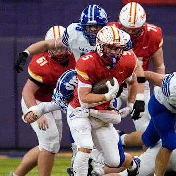 Kuemper Catholic’s Jarin Hoffman (5) carries the ball against the Van Meter Bulldogs Nov. 21, 2025 during the Class 2A high school state football championship at the UNI-Dome in Cedar Falls, Iowa.