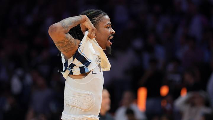 Apr 3, 2025; Miami, Florida, USA; Memphis Grizzlies guard Ja Morant (12) reacts after scoring the game-winning shot against the Miami Heat during the fourth quarter at Kaseya Center. Mandatory Credit: Sam Navarro-Imagn Images