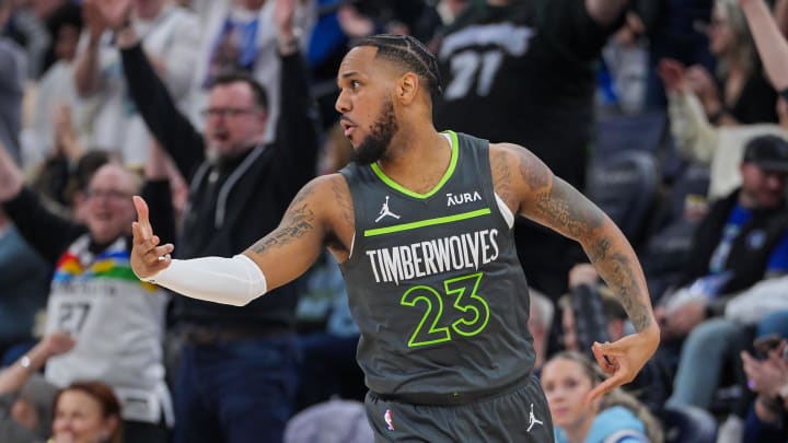 Mar 24, 2024; Minneapolis, Minnesota, USA; Minnesota Timberwolves guard Monte Morris (23) celebrates his basket against the Golden State Warriors in the fourth quarter at Target Center. Mandatory Credit: Brad Rempel-USA TODAY Sports