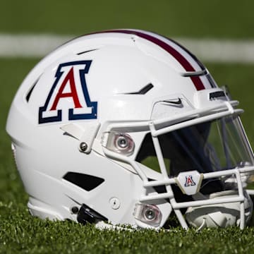 Nov 25, 2022; Tucson, Arizona, USA; Detailed view of an Arizona Wildcats helmet on the field during the Territorial Cup at Arizona Stadium. Mandatory Credit: Mark J. Rebilas-Imagn Images