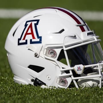 Nov 25, 2022; Tucson, Arizona, USA; Detailed view of an Arizona Wildcats helmet on the field during the Territorial Cup at Arizona Stadium. Mandatory Credit: Mark J. Rebilas-Imagn Images
