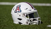 Nov 25, 2022; Tucson, Arizona, USA; Detailed view of an Arizona Wildcats helmet on the field during the Territorial Cup at Arizona Stadium.