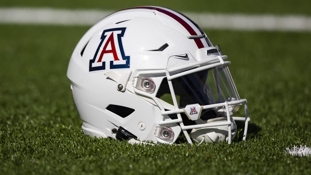 Nov 25, 2022; Tucson, Arizona, USA; Detailed view of an Arizona Wildcats helmet on the field during the Territorial Cup at Arizona Stadium. Mandatory Credit: Mark J. Rebilas-Imagn Images