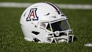Nov 25, 2022; Tucson, Arizona, USA; Detailed view of an Arizona Wildcats helmet on the field during the Territorial Cup at Arizona Stadium. Mandatory Credit: Mark J. Rebilas-Imagn Images