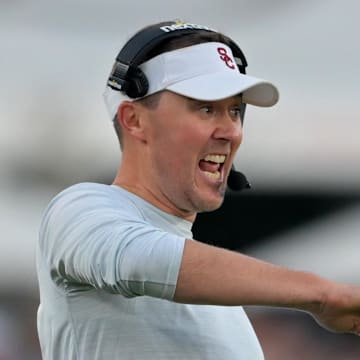 Oct 8, 2022; Los Angeles, California, USA;  USC Trojans head coach Lincoln Riley calls a play in the first half against the Washington State Cougars at United Airlines Field at Los Angeles Memorial Coliseum. 