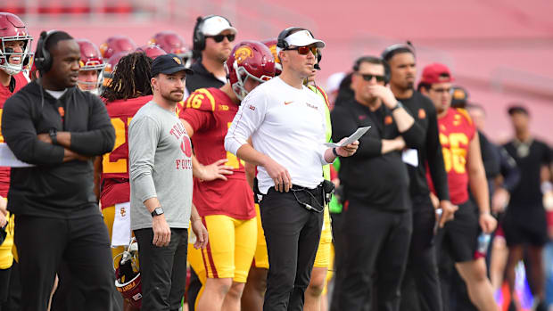 Southern California Trojans head coach Lincoln Riley watches game action against the Notre Dame Fighting Irish during the fir